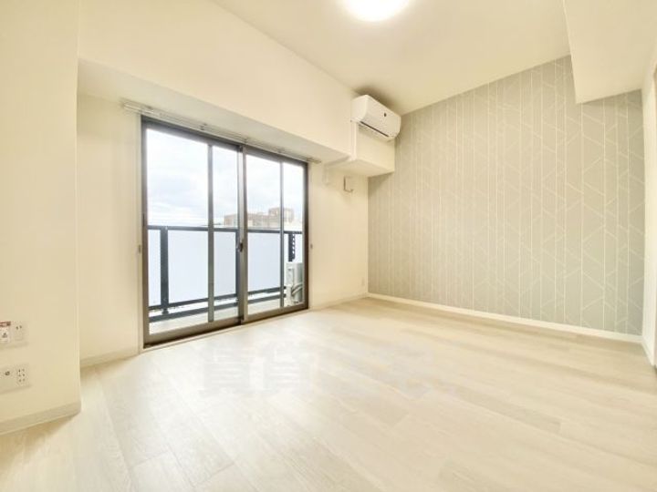 大阪府摂津市正雀本町1丁目の賃貸マンションの居間