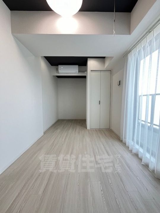 大阪府堺市堺区神明町西1丁の賃貸マンションの居間