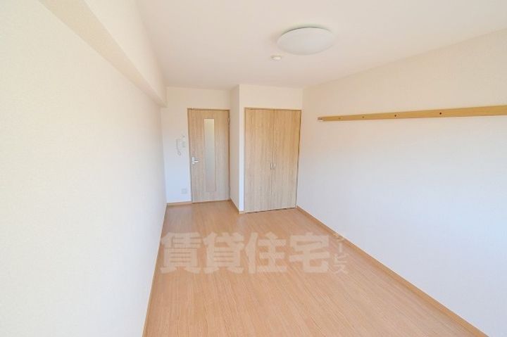 滋賀県草津市野路東4丁目の賃貸マンションの居間