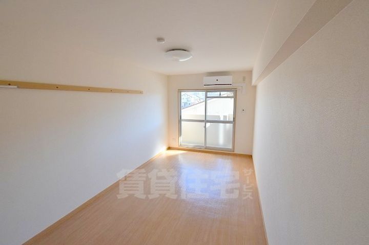 滋賀県草津市野路東4丁目の賃貸マンションの居間