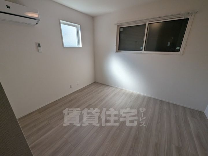 大阪府茨木市水尾1丁目の賃貸アパートの寝室