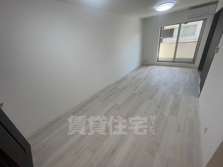大阪府堺市西区浜寺石津町東5丁の賃貸アパートの居間