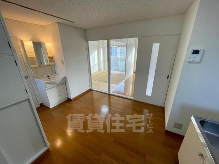 大阪府豊中市浜2丁目の賃貸マンションの居間