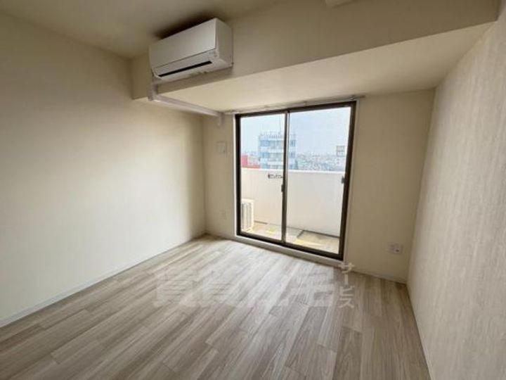 大阪府豊中市宝山町の賃貸マンションの居間