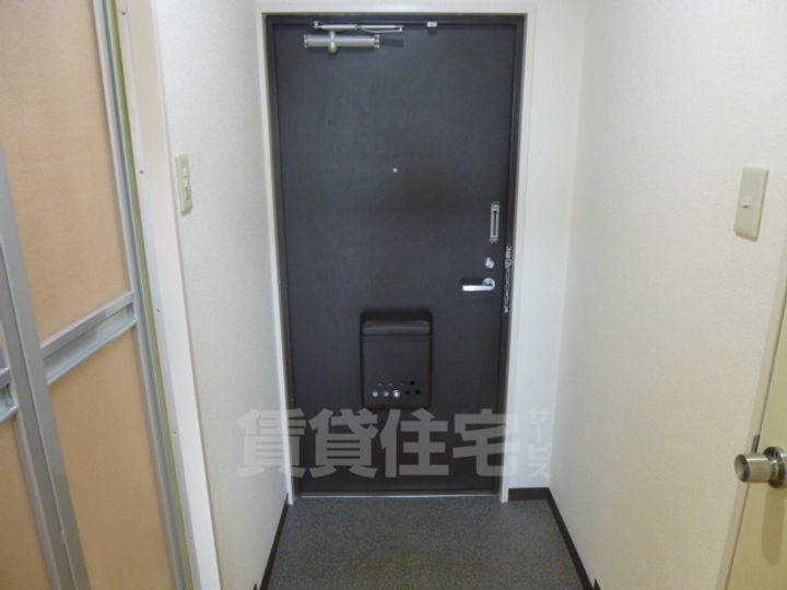 Riora塚本2の玄関