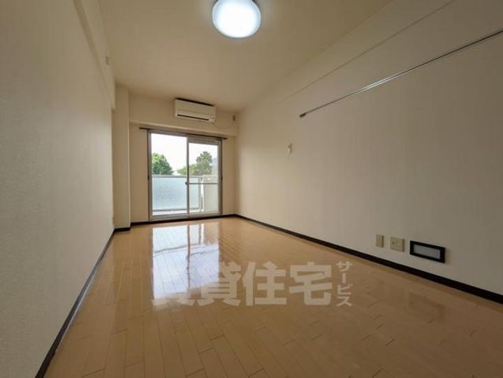 大阪府茨木市南春日丘1丁目の賃貸マンションの寝室