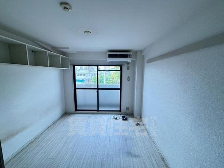 ジュネス蛍池の寝室