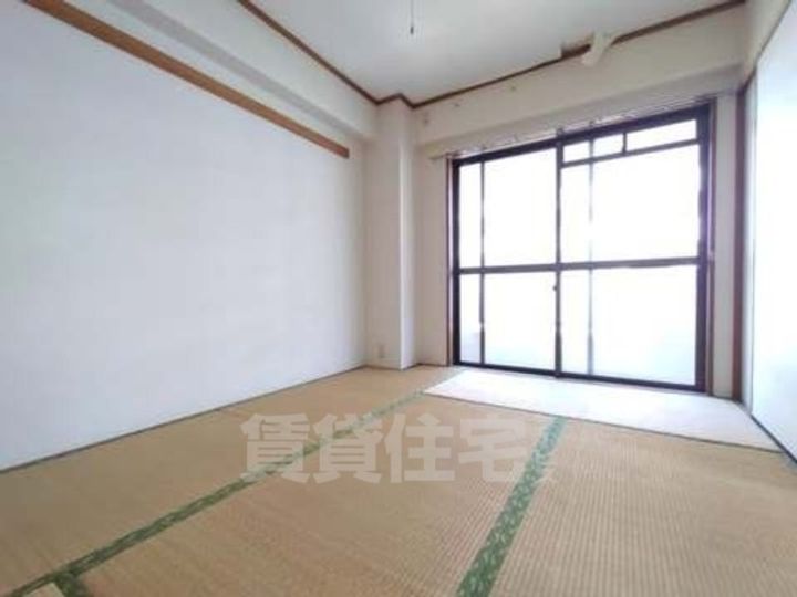 大阪府摂津市千里丘東4丁目の賃貸マンションの寝室