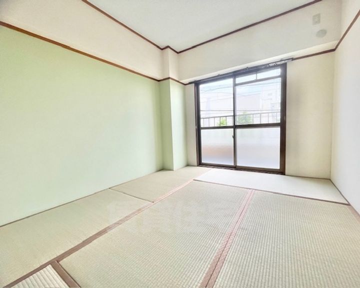 大阪府摂津市学園町2丁目の賃貸マンションの寝室