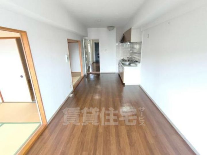 大阪府豊中市西泉丘1丁目の賃貸マンションの居間