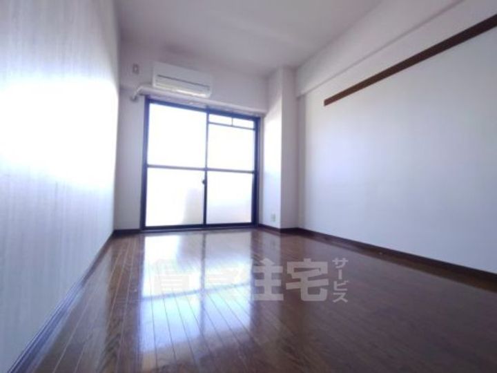 大阪府吹田市山田東1丁目の賃貸マンションの寝室