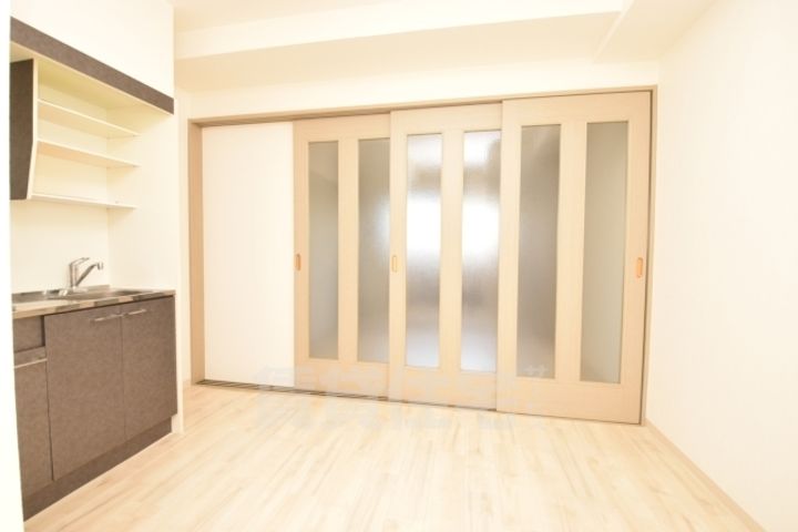 大阪府堺市北区中百舌鳥町6丁の賃貸マンションの居間