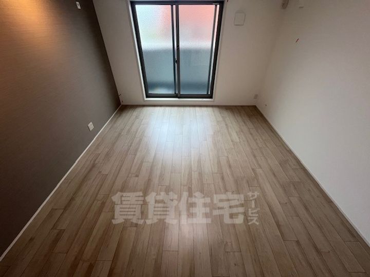 大阪府堺市西区上野芝町4丁の賃貸アパートの寝室