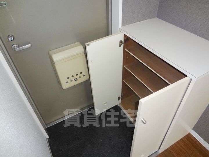 オーケーマンション平野303の玄関