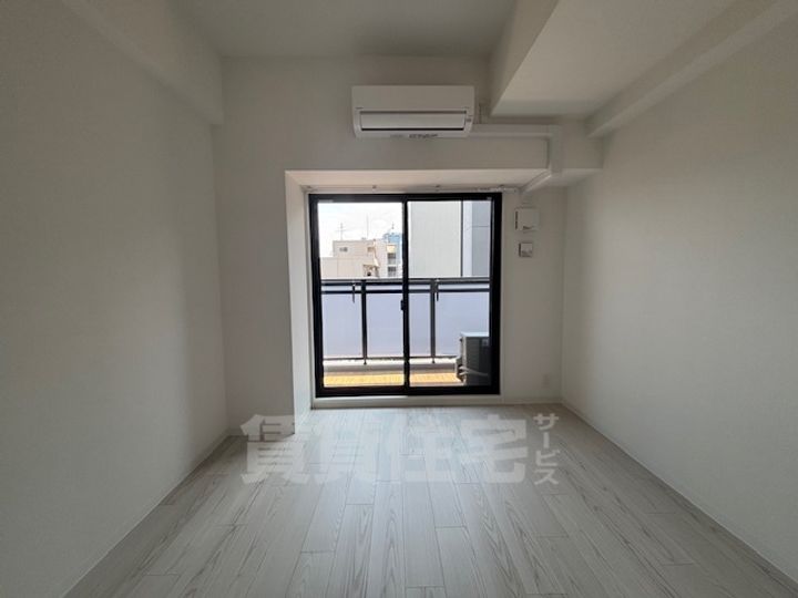 大阪府堺市堺区熊野町東4丁の賃貸マンションの居間
