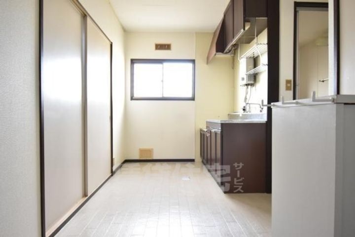 大阪府堺市北区大豆塚町2丁の賃貸マンションの居間