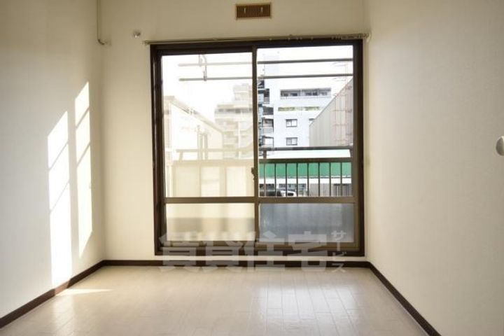 大阪府堺市北区大豆塚町2丁の賃貸マンションの居間