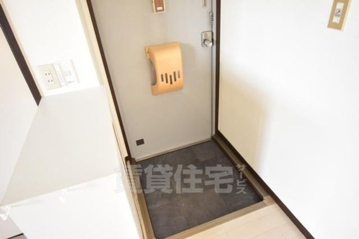 大阪府堺市北区大豆塚町2丁の賃貸マンションの玄関