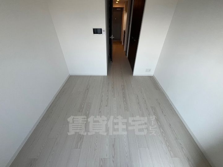 大阪府堺市堺区熊野町東4丁の賃貸マンションの寝室