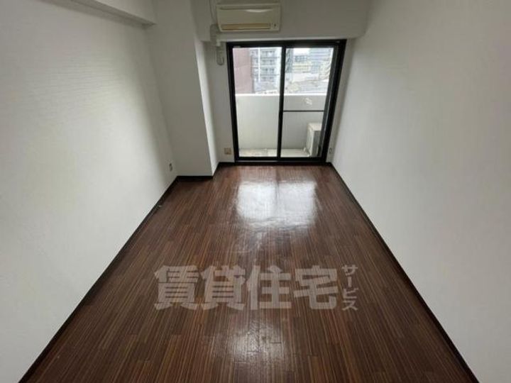 大阪府大阪市都島区中野町1丁目の賃貸マンションの居間