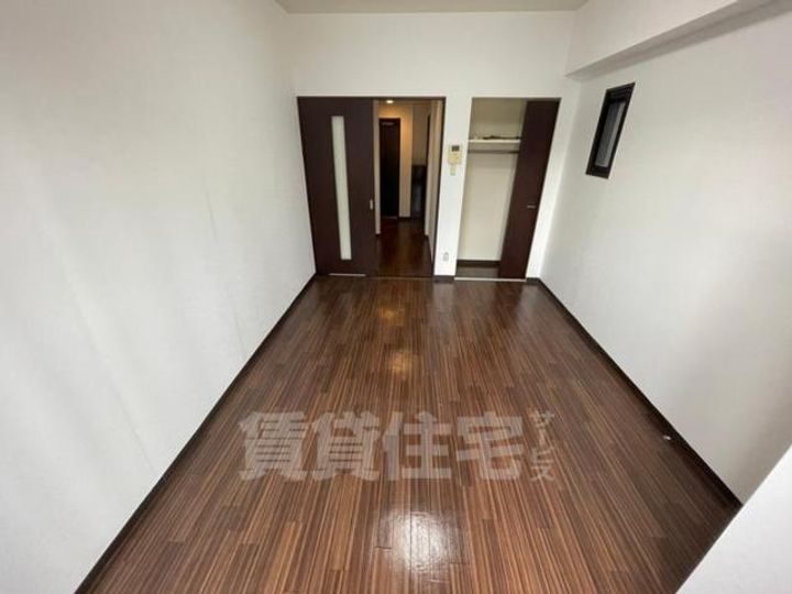 大阪府大阪市都島区中野町1丁目の賃貸マンションの居間