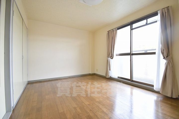 グランドコーポTAKA1の寝室