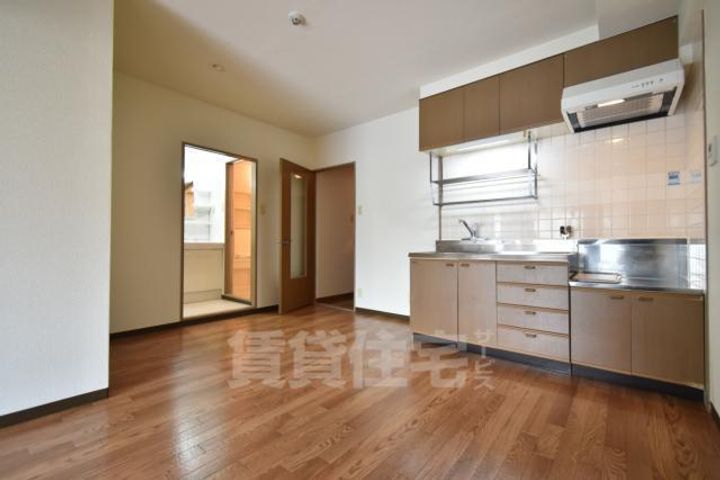 大阪府堺市堺区東雲西町2丁の賃貸マンションの居間