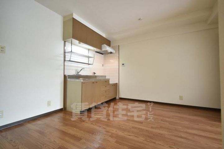 大阪府堺市堺区東雲西町2丁の賃貸マンションの居間