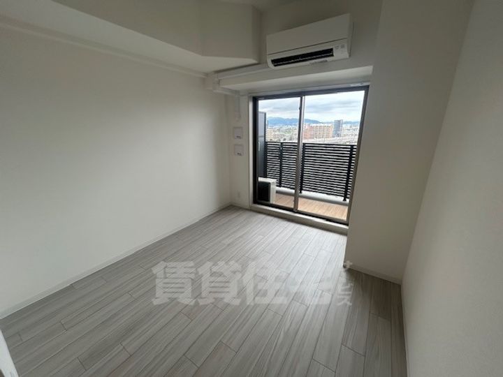 大阪府大阪市淀川区加島3丁目の賃貸マンションの居間