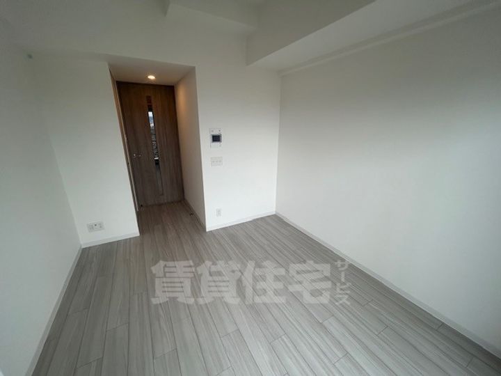 大阪府大阪市淀川区加島3丁目の賃貸マンションの居間