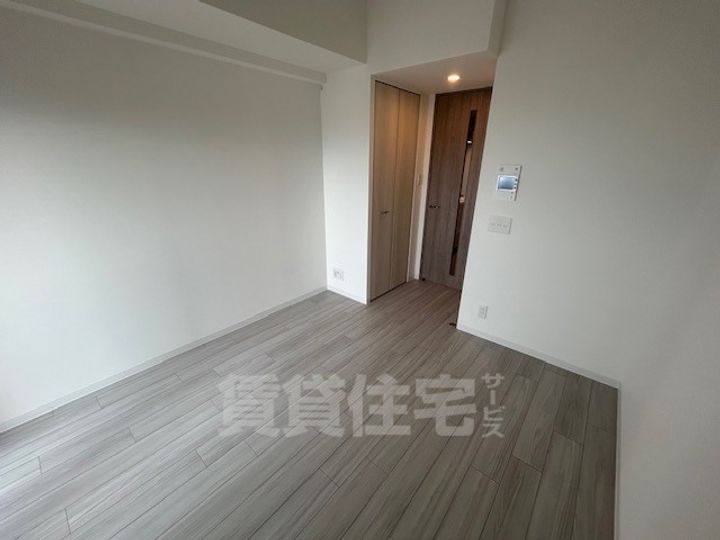 大阪府大阪市淀川区加島3丁目の賃貸マンションの居間