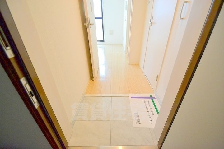 パレス東洋豊里2号館の玄関