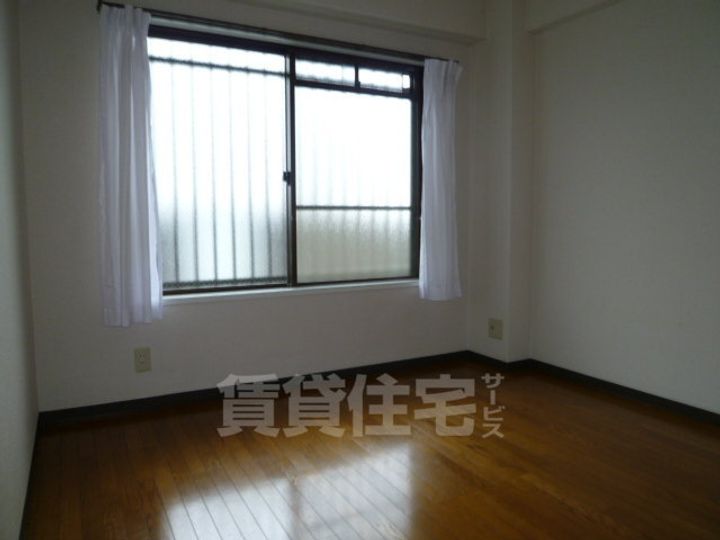 大阪府茨木市奈良町の賃貸マンションの寝室