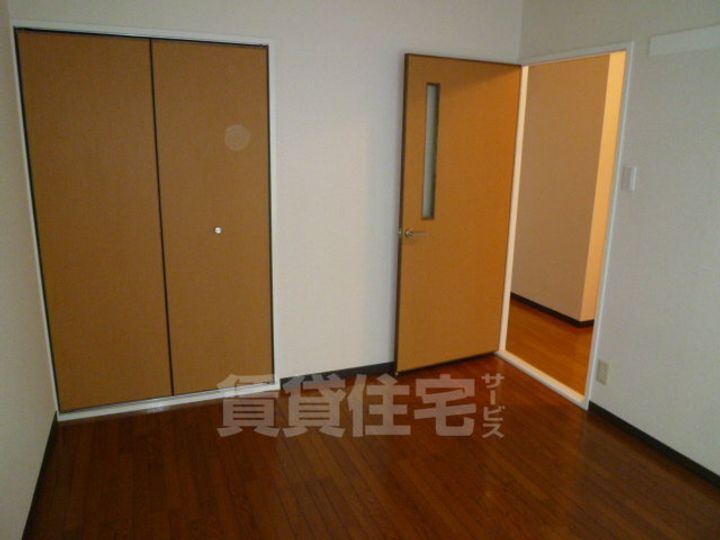 大阪府茨木市奈良町の賃貸マンションの寝室