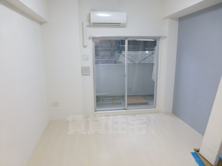 大阪府堺市堺区宿院町東4丁の賃貸マンションの居間