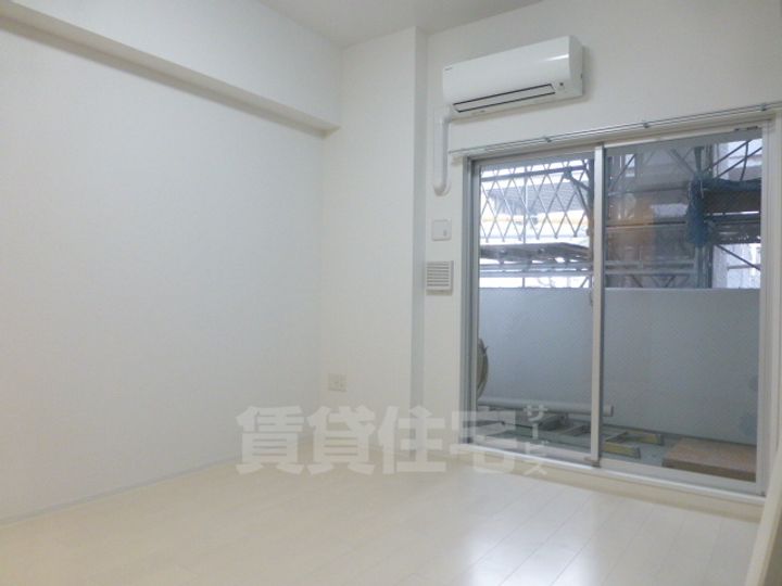 大阪府堺市堺区宿院町東4丁の賃貸マンションの居間