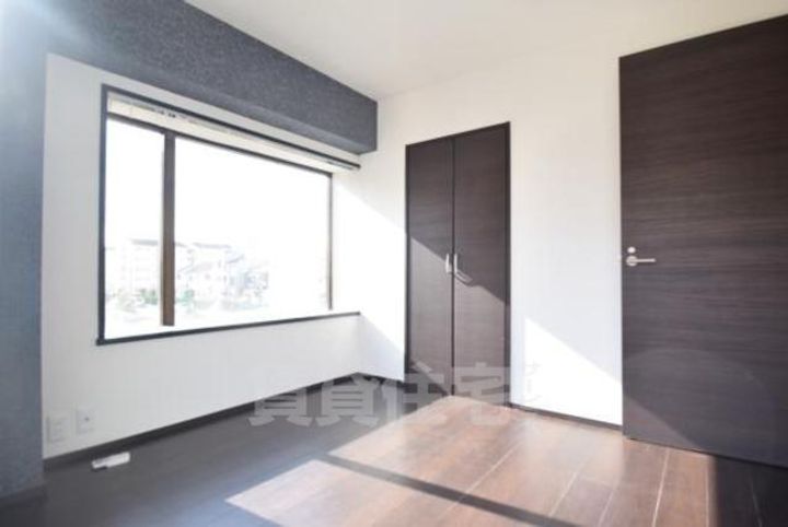 大阪府茨木市玉櫛1丁目の賃貸マンションの居間