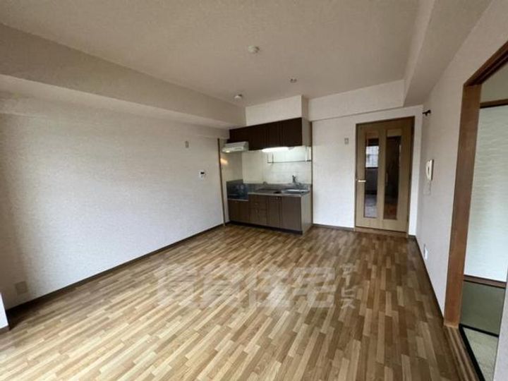 大阪府大阪市西淀川区歌島3丁目の賃貸マンションの居間