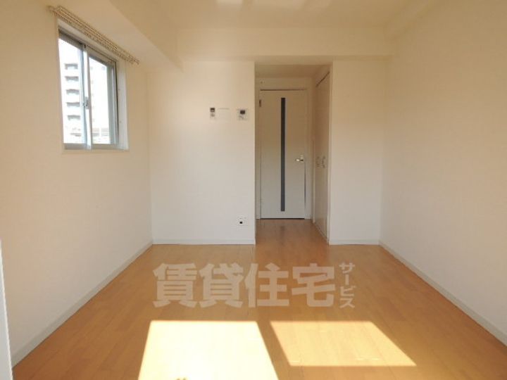 グローリア新北野の居間