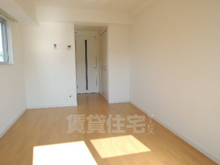 グローリア新北野の居間