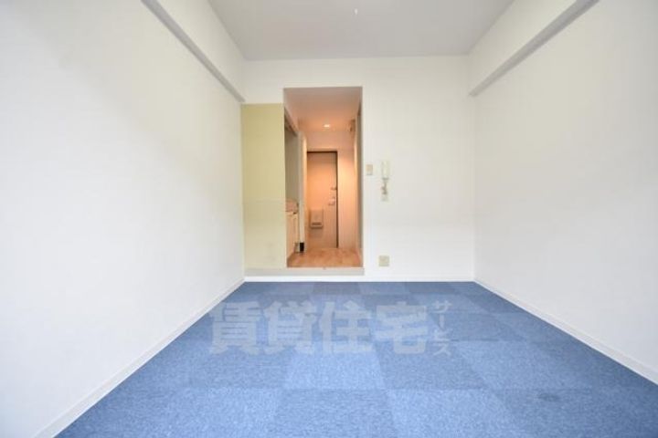 大阪府堺市北区東三国ヶ丘町5丁の賃貸マンションの居間