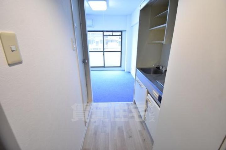 大阪府堺市北区東三国ヶ丘町5丁の賃貸マンションの玄関