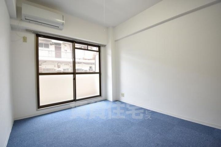 大阪府堺市北区東三国ヶ丘町5丁の賃貸マンションの寝室