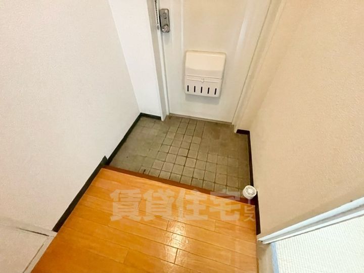 大阪府茨木市玉櫛2丁目の賃貸マンションの玄関