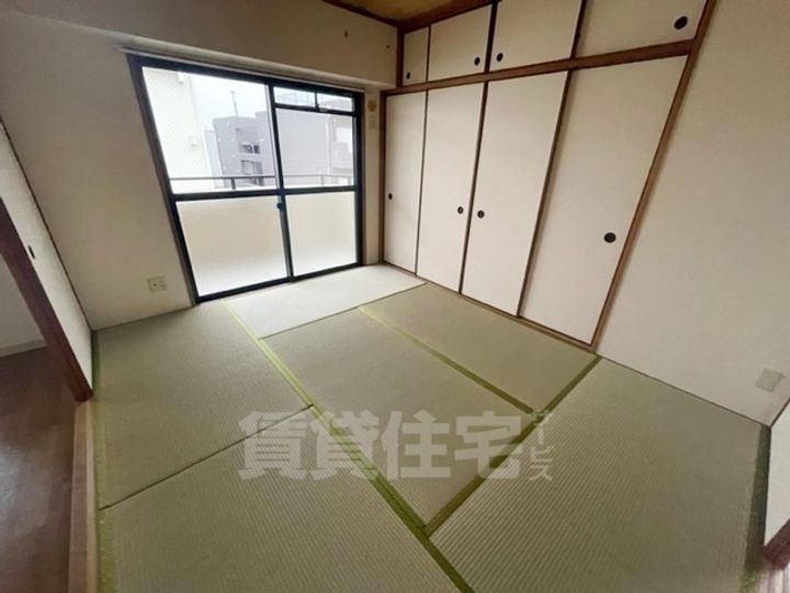 大阪府茨木市玉島2丁目の賃貸マンションの寝室
