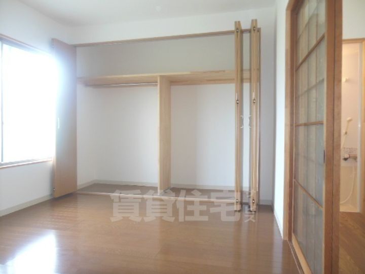 大阪府茨木市丑寅1丁目の賃貸マンションの居間