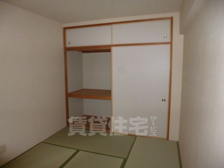 グドゥウェル新石切の寝室