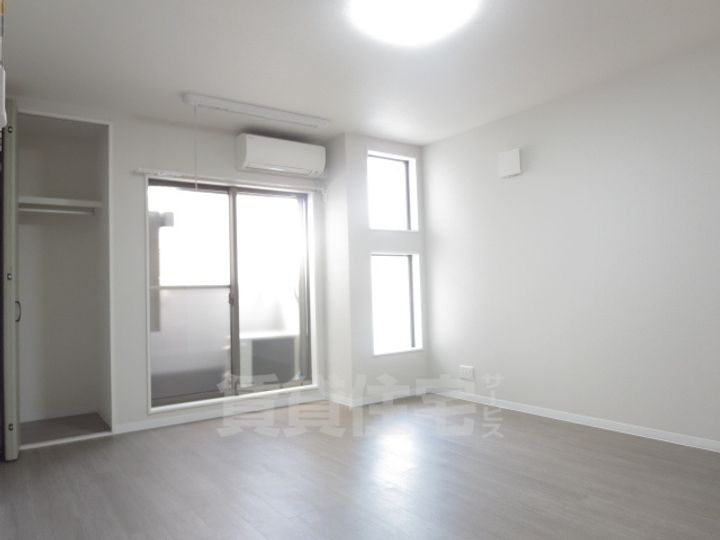 大阪府堺市堺区寺地町西3丁の賃貸アパートの居間