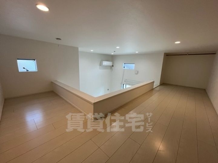 大阪府堺市堺区昭和通2丁の賃貸アパートの寝室