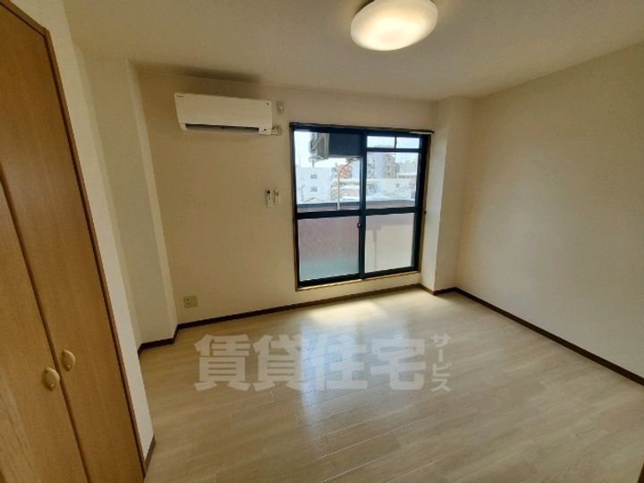 エスパシオ(十三元今里)の寝室